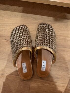 Alaïa Gold Woven Mule Slides